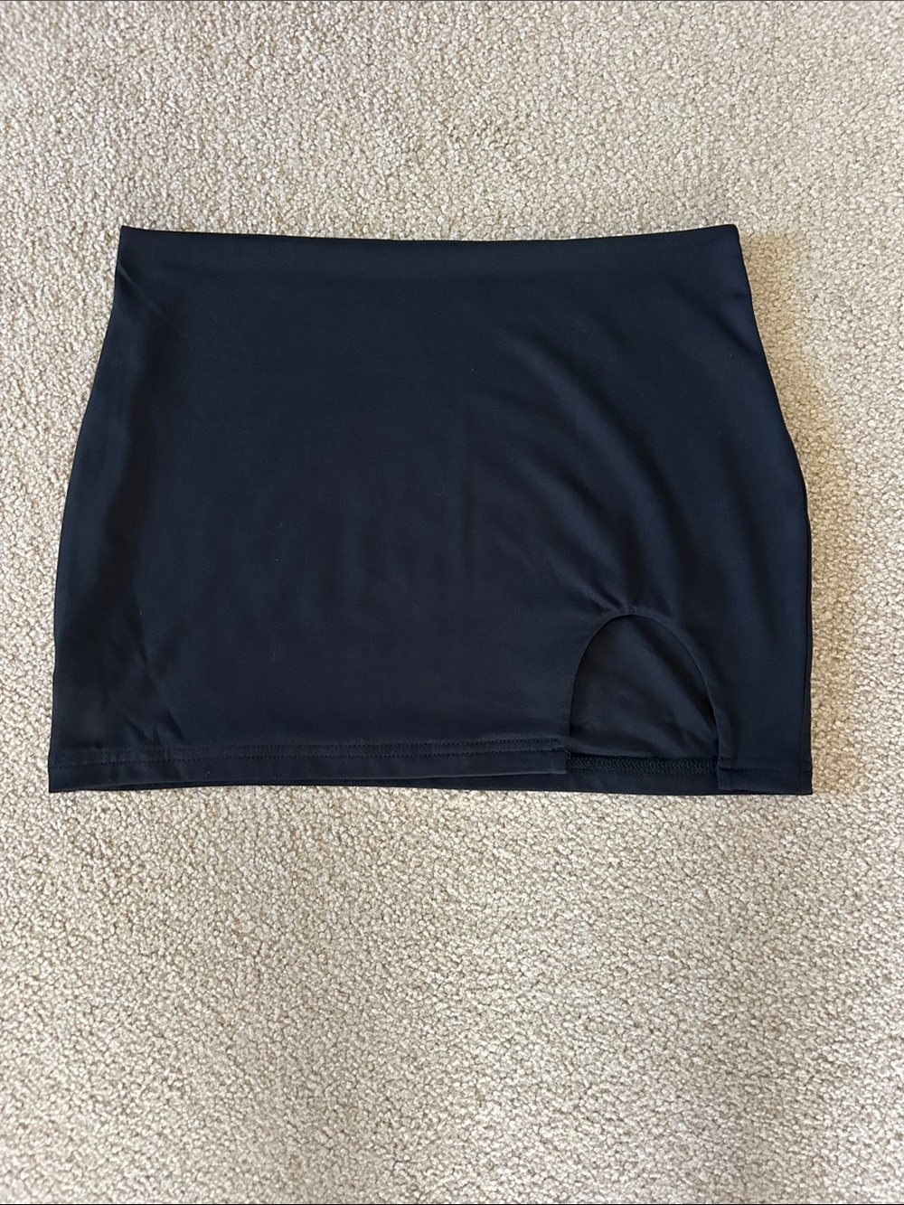 Small black stretchy mini skirt